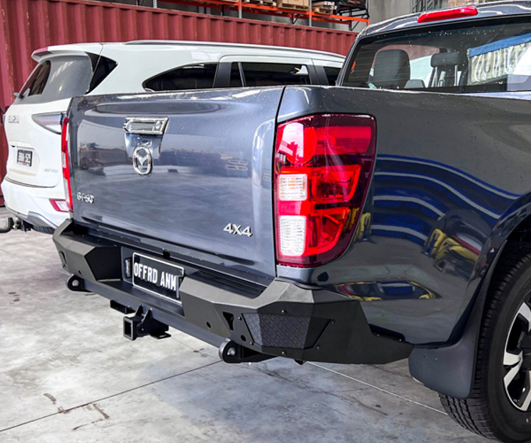 lead up to the reveal of the sixth-generation Mitsubishi Triton, the Japanese carmaker has published a set of shadowy teaser images that show off some of the production ute’s exterior design. It has also uploaded a YouTube video.