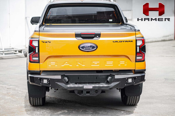 Externally, the Wildtrak is distinguished from other Rangers by its own grille, roof rails, sports bar with integrated tie-down rails, 18-inch alloy wheels mated with Goodyear Wrangler all-terrain rubber, a powered roller shutter for the load box and exterior mirrors with puddle maps and zone lighting.