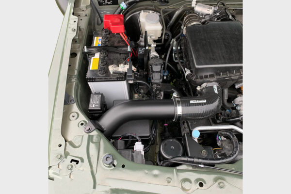 Connects to factory airbox using a custom fabricated aluminium intake pipe, which replaces the factory rubber item and runs an inbuilt water trap in the intermediate piping. No modification of the factory airbox is required.