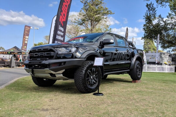 Aussie Raptor costs a hefty $74,990 (excluding on-roads) but its line-up is a refreshingly simple one: it is available as a dual-cab with the auto – that's it. No choice is your only choice. You do, however, get to select from a stack of exterior colours including, 'Lightning Blue', 'Race Red', 'Shadow Black', 'Frozen White', and 'Conquer Grey'